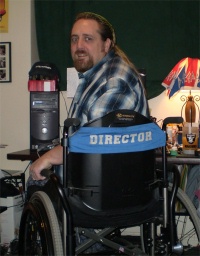 Larry sitting at desk